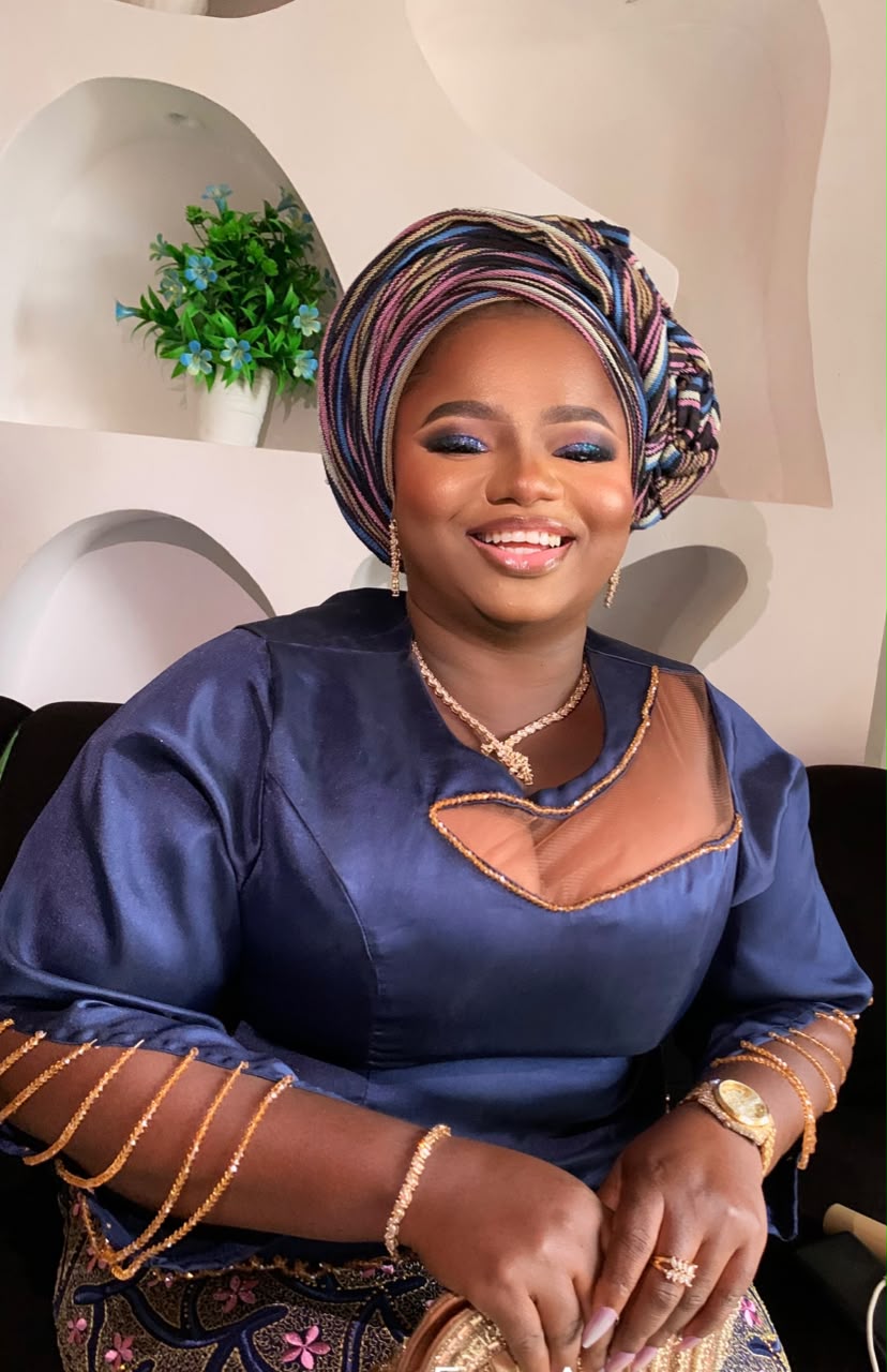 Navy outfit with patterned gele