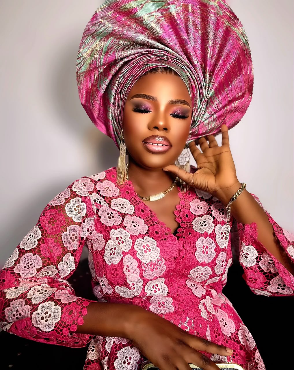 Pink lace and gele occasion glam
